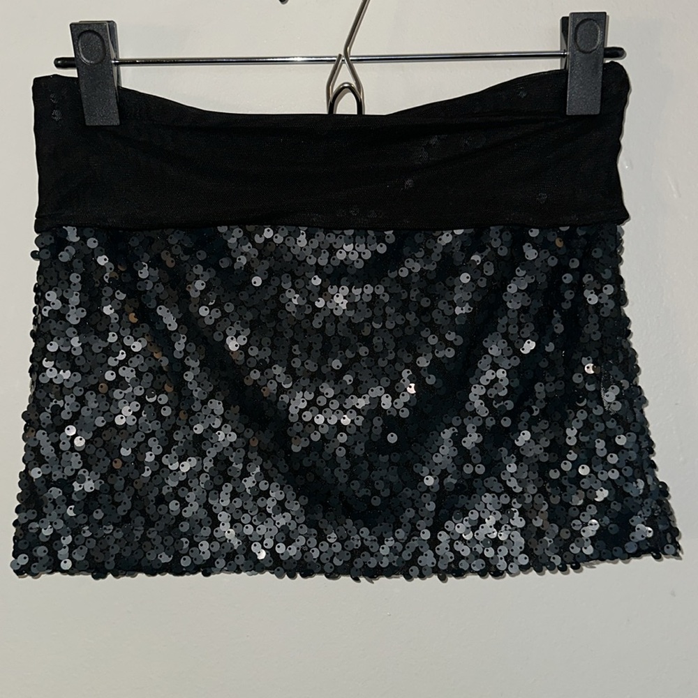 Black sequined mini skirt with mesh at the top. Size M